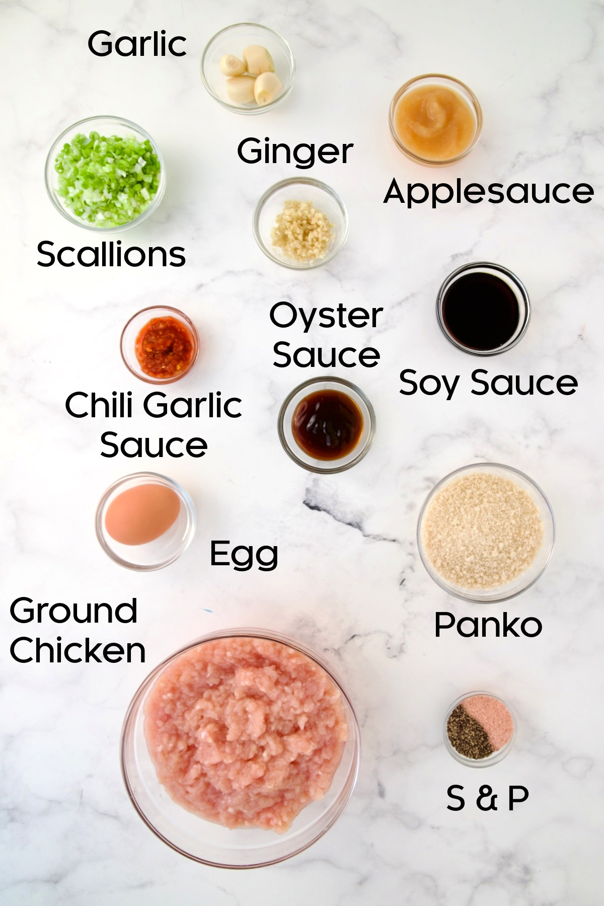 Ingredients for Asian Chicken Meatballs in glass bowls.