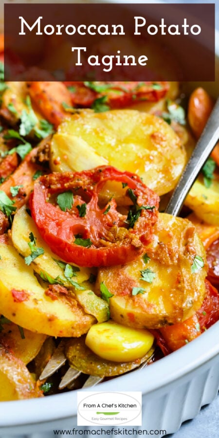 Pinterest graphic for Moroccan Potato Tagine showing it in a round white baking dish with serving fork.