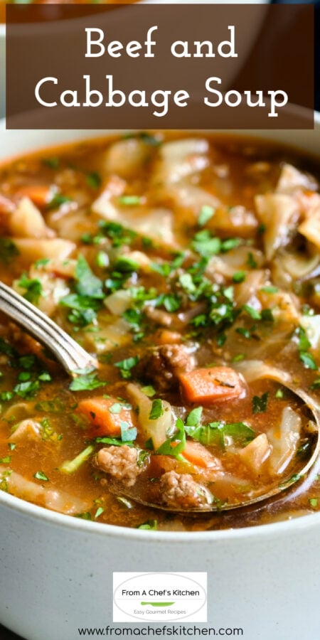 Pinterest graphic for Beef and Cabbage Soup showing it a white soup bowl with soup spoon.