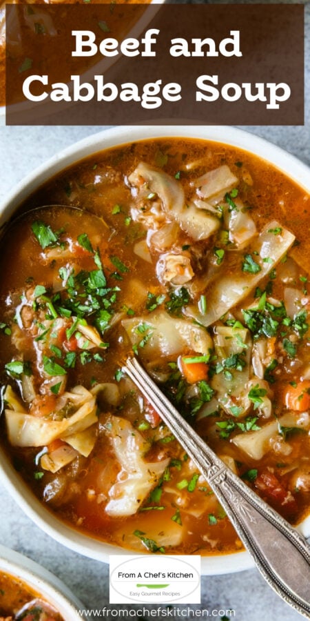 Pinterest graphic for Beef and Cabbage Soup showing it a white soup bowl with soup spoon.