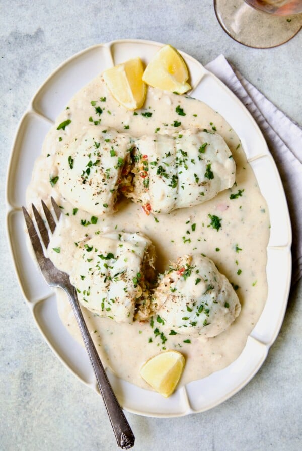 Two servings of Crab-Stuffed Flounder on oval platter.