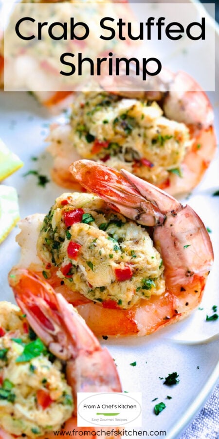 Pinterest graphic for Crab Stuffed Shrimp showing it on an oval platter garnished with lemon wedges.