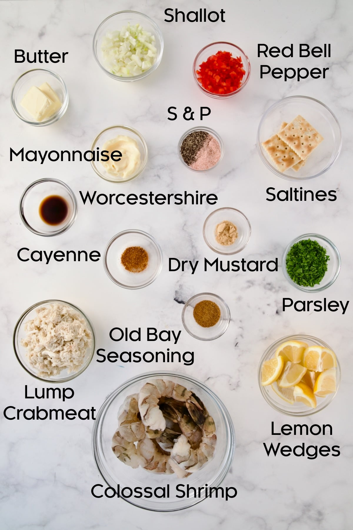 Ingredient for Crab-Stuffed Shrimp in glass bowls.