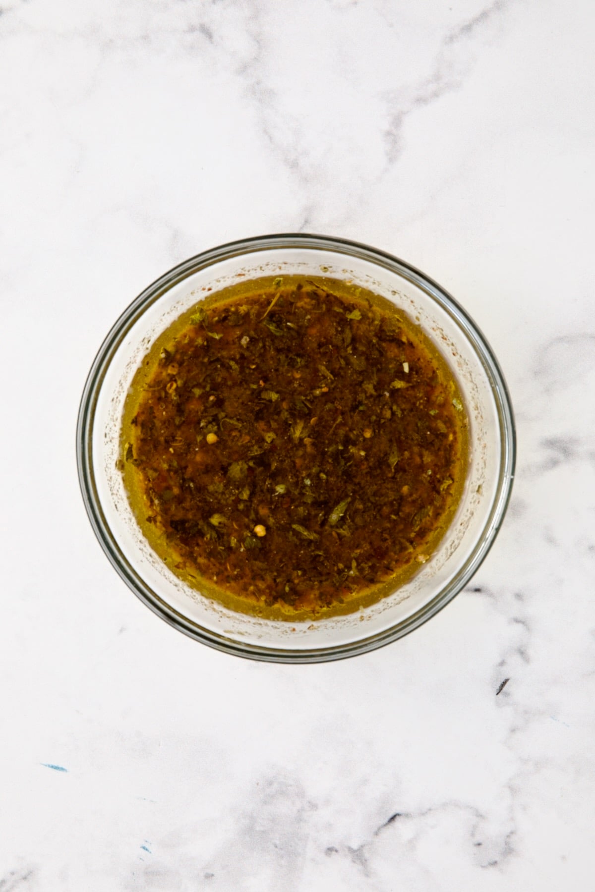 Marinade in glass bowl.