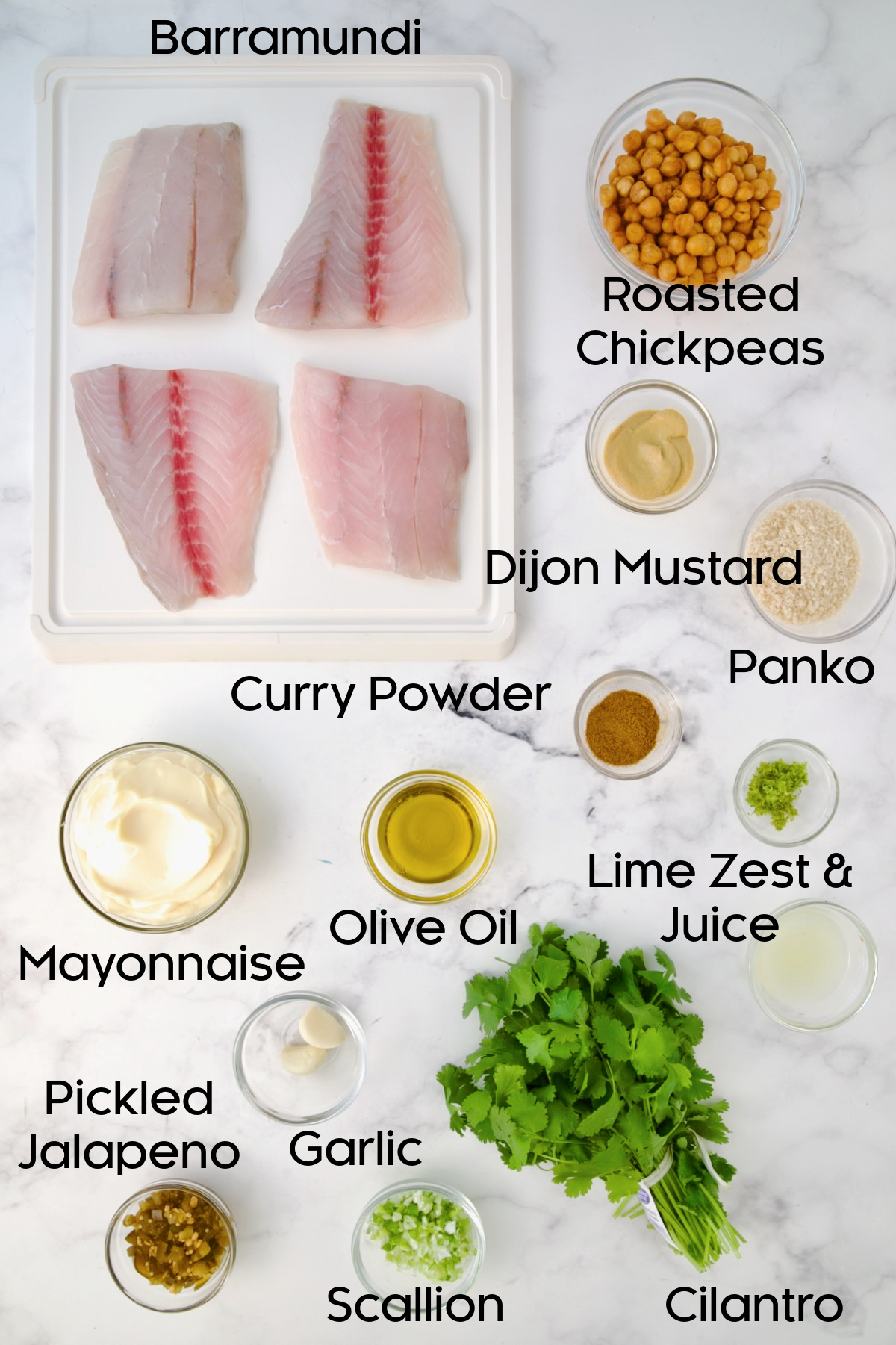 Ingredients for Crispy Chickpea-Crusted Fish in glass bowls.