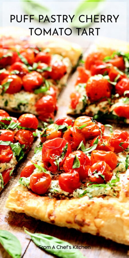 Pinterest graphic for Puff Pastry Cherry Tomato Tart showing it cut into four squares on a wood cutting board.