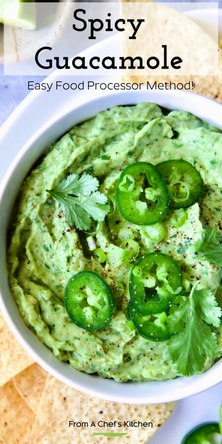 Pinterest graphic for Spicy Guacamole showing it in a white bowl surrounded by tortilla chips, garnished with jalapeno slices and cilantro leaves.
