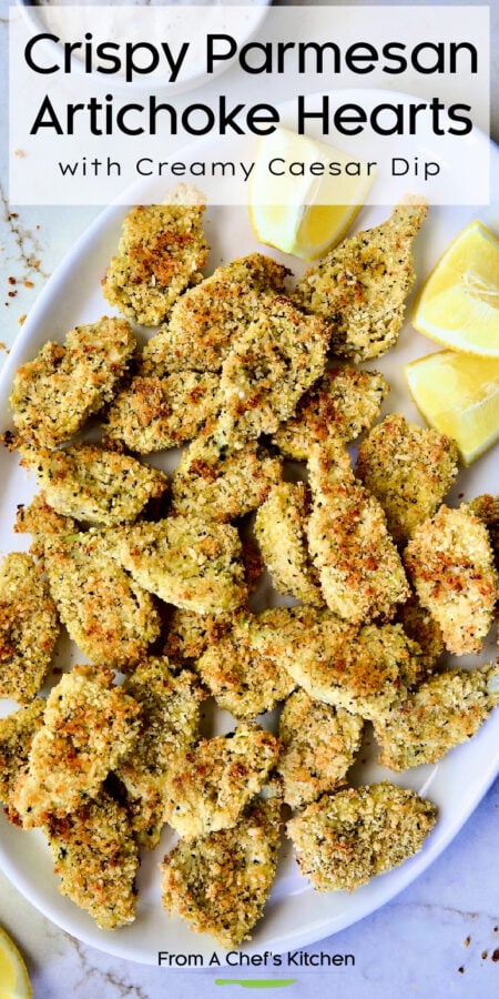 Pinterest graphic for Crispy Parmesan Artichoke Hearts showing them on a white platter with lemon wedges.