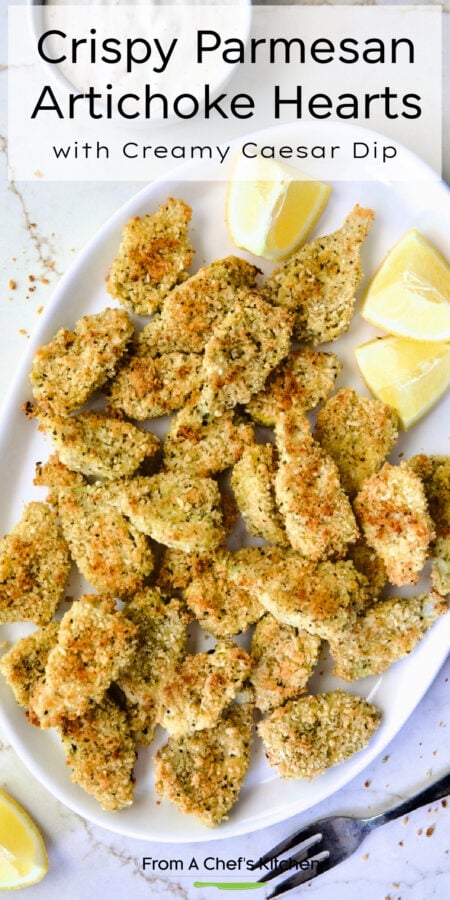 Pinterest graphic for Crispy Parmesan Artichoke Hearts showing them on a white platter with lemon wedges and serving fork.