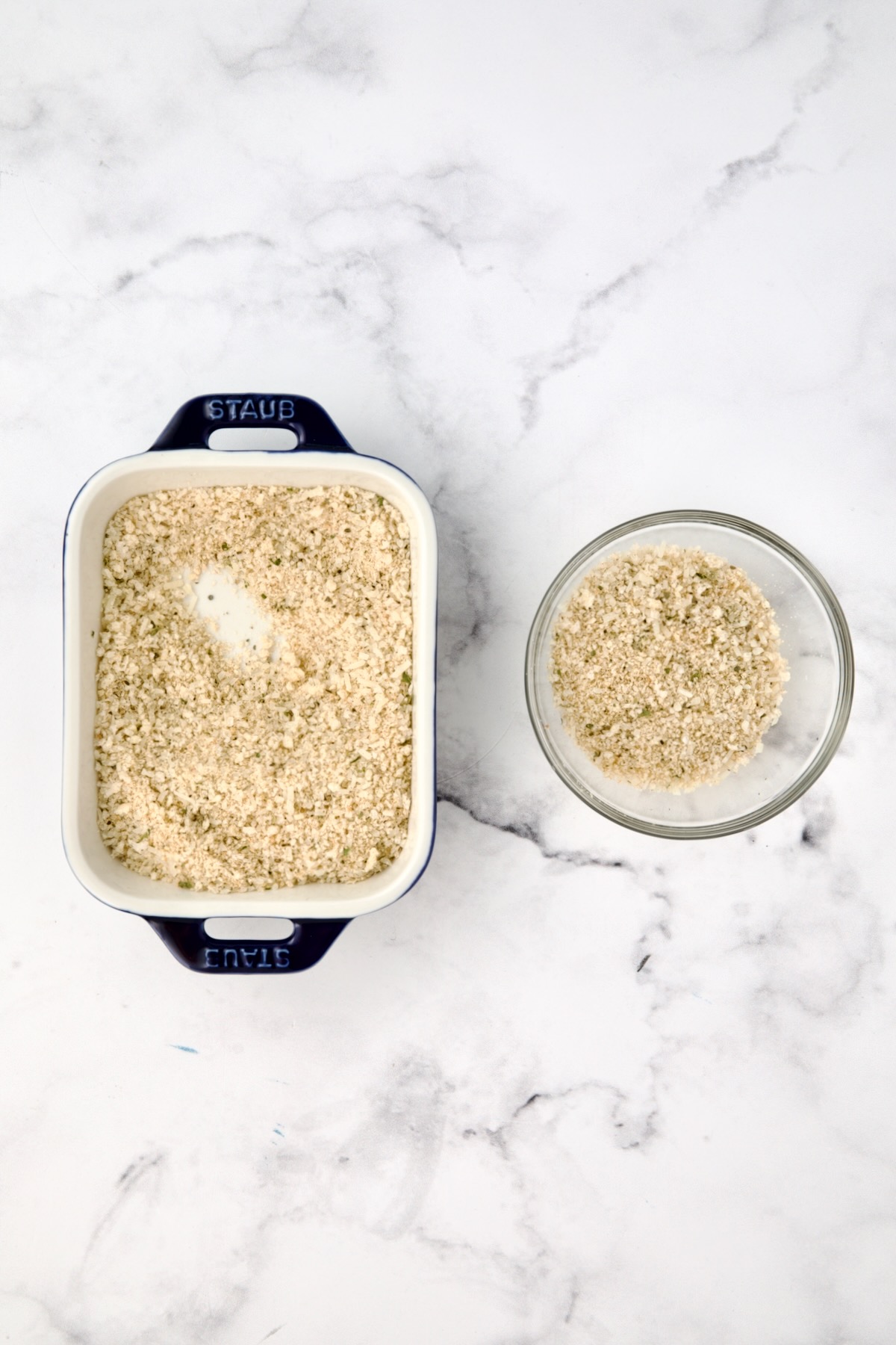 Breadcrumbs in two small containers.