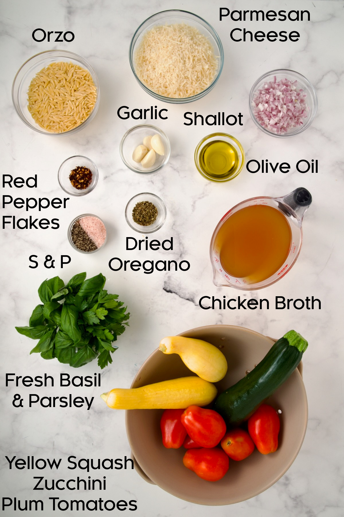 Ingredients for Orzo Vegetable Tian in glass bowls.