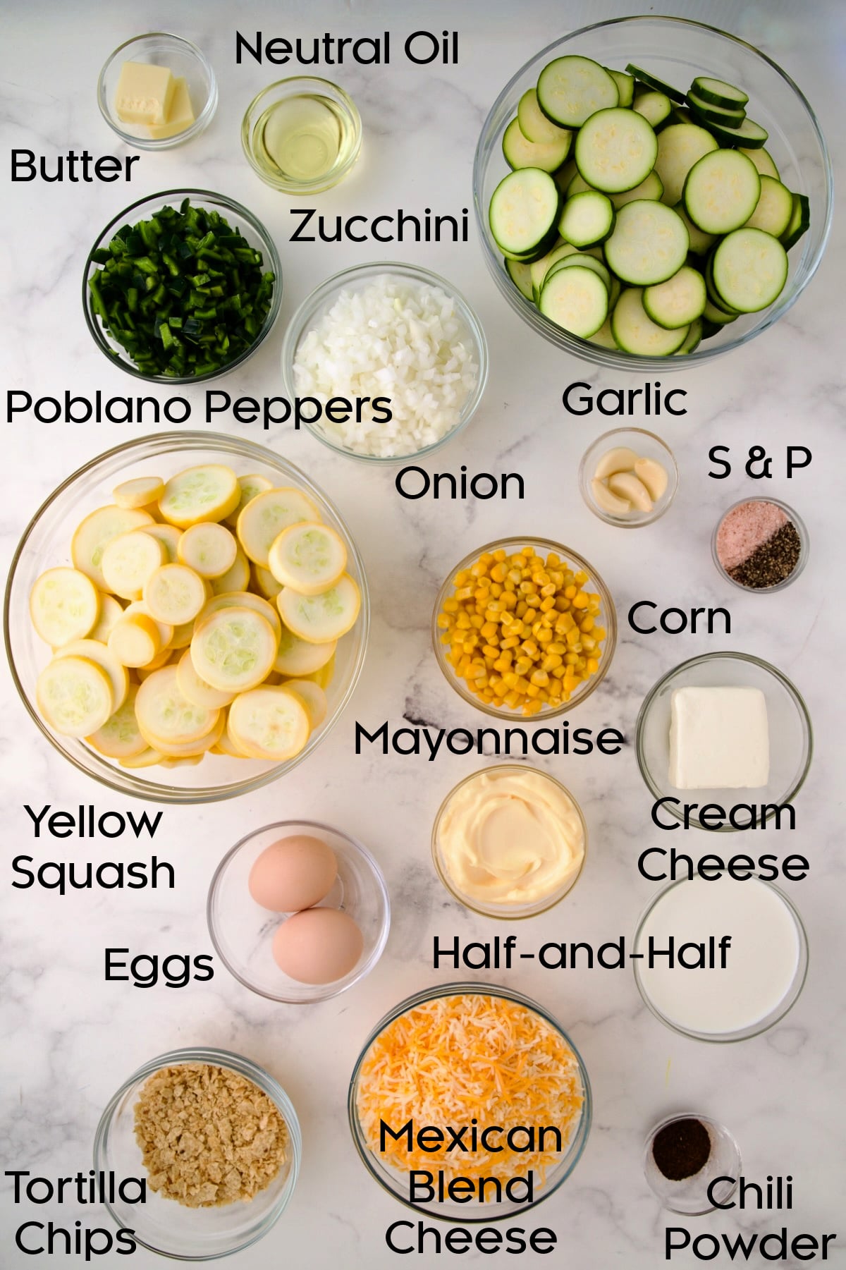 Ingredients for Summer Squash Corn Poblano Casserole in glass bowls.