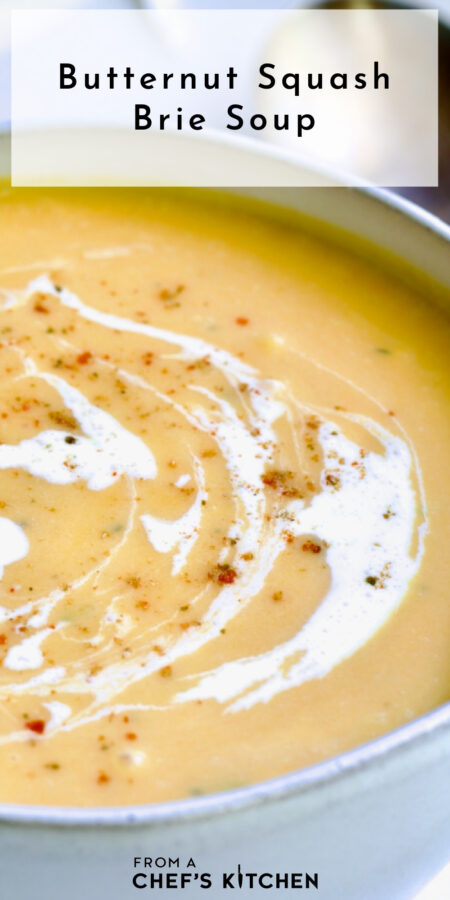 Pinterest graphic for Butternut Squash Brie Soup showing close-up of one bowl.