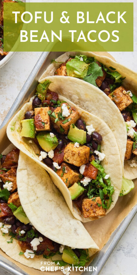 Pinterest graphic for Tofu and Black Bean Tacos showing three on a parchment paper-lined aluminum tray.