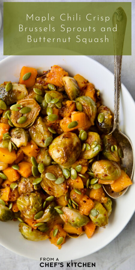 Pinterest graphic for Maple Chili Crips Brussels Sprouts Butternut Squash showing it in a white serving bowl with serving spoon.