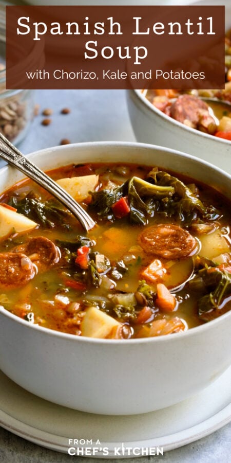 Pinterest graphic showing Spanish Lentil Soup showing one serving in a white bowl with soup spoon.