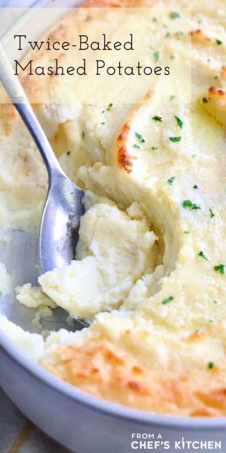 Pinterest graphic for Twice-Baked Mashed Potatoes showing them in an oval baking dish with serving spoon scooping some out.