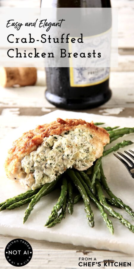 Pinterest graphic for Crab-Stuffed Chicken Breasts showing one serving over asparagus on a thin marble slab.