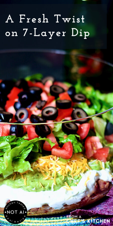 Pinterest graphic for 7-Layer Dip showing it in a glass bowl.