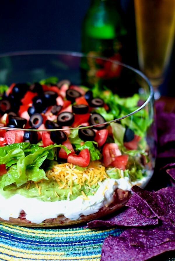 Seven Layer Dip in glass bowl.