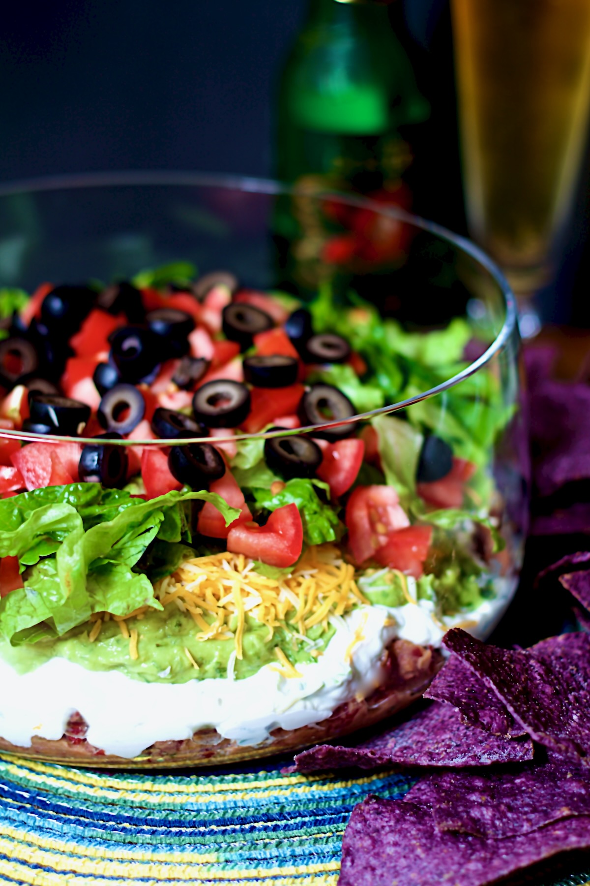 Seven Layer Dip in glass bowl.