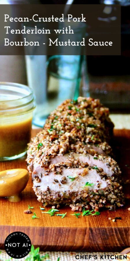 Pinterest graphic for Pecan-Crusted Pork Tenderloin with Bourbon Mustard Sauce showing it on a wood cutting board.