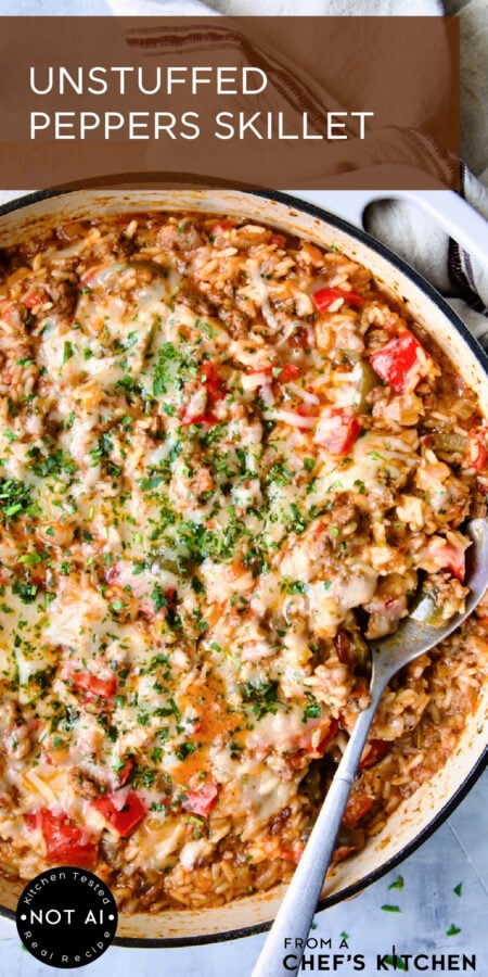 Pinterest graphic for Unstuffed Peppers Skillet showing it in a white enamel cast iron skillet with serving spoon.