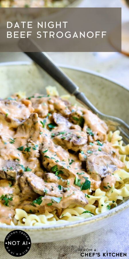 Pinterest graphic for Date Night Beef Stroganoff showing it in an earthenware bowl over egg noodles.