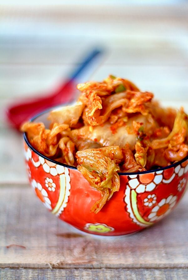 Easy Homemade Kimchi in red bowl.