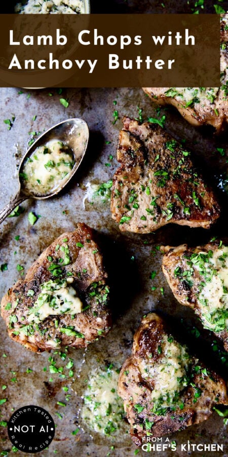 Pinterest graphic for Lamb Chops with Anchovy Butter showing them on a patinated sheet pan with some of the butter on a spoon.