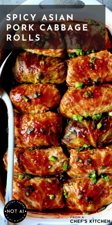 Pinterest graphic for Spicy Asian Pork Cabbage Rolls showing them lined up in a white baking dish with white serving spoon.