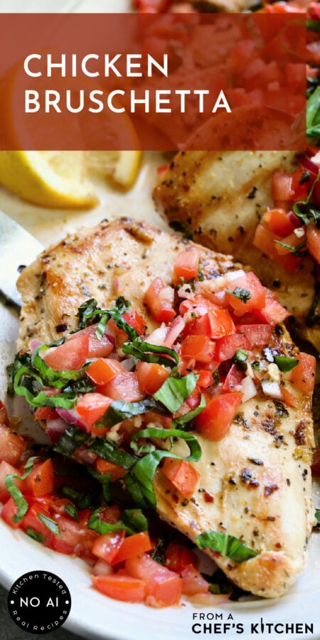 Pinterest graphic for Chicken Bruschetta showing one breast garnished with fresh basil.