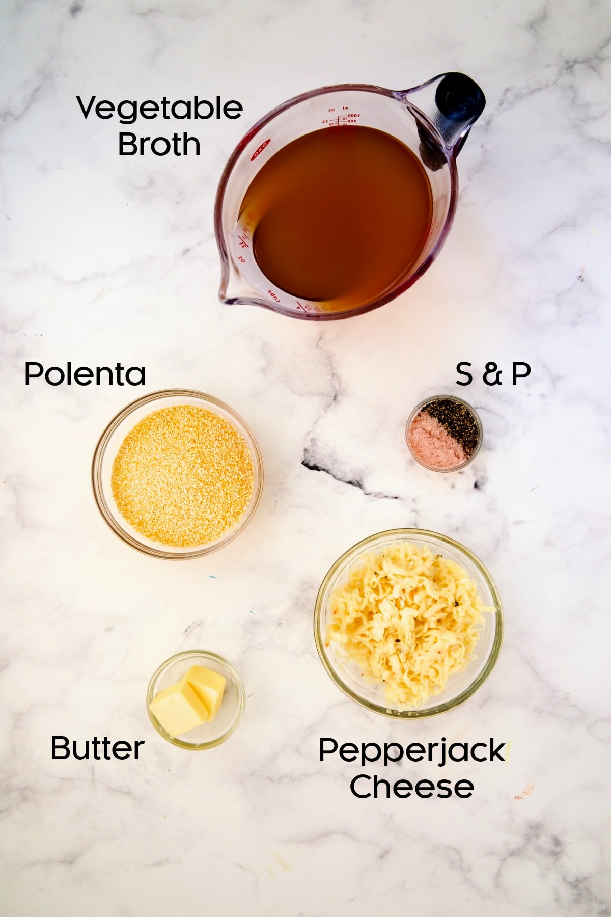 Ingredients for polenta in glass bowls.