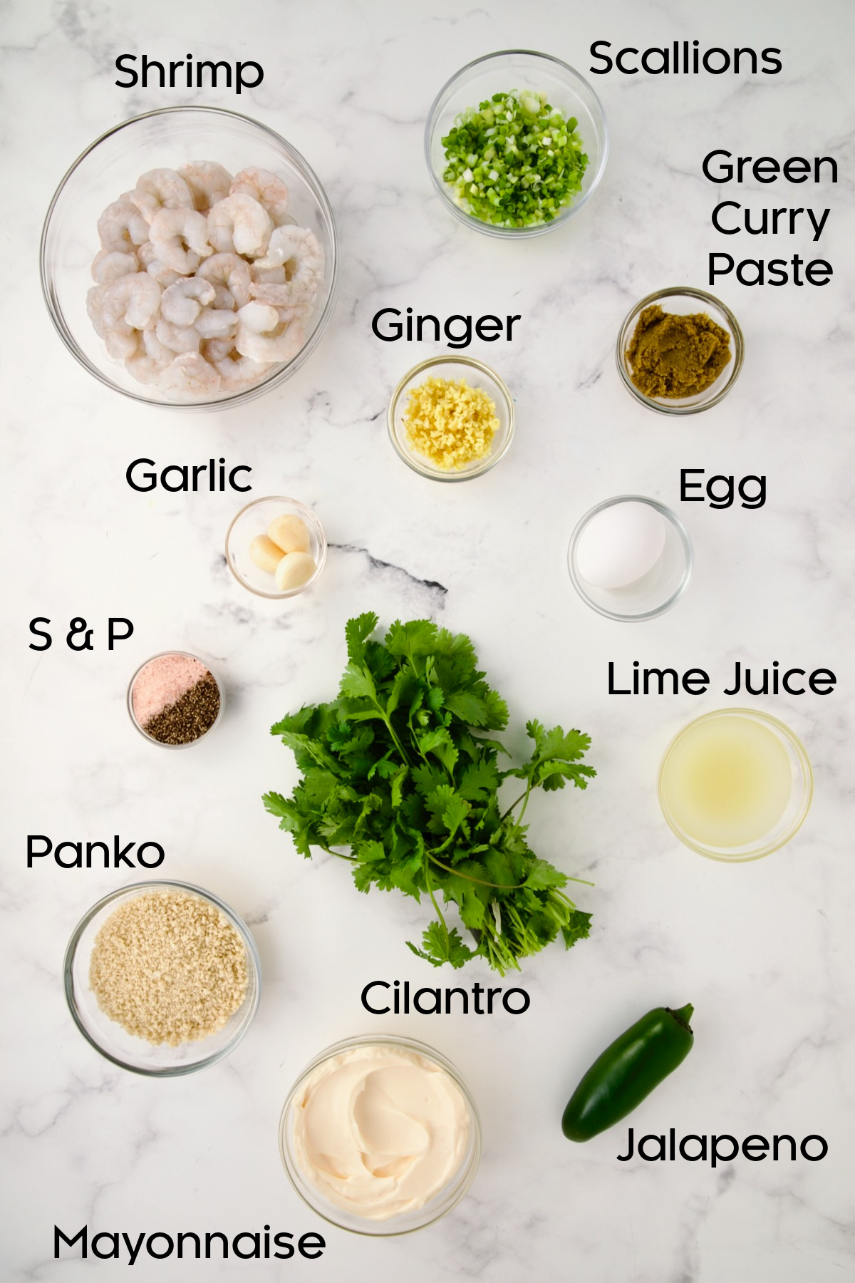 Ingredients for Thai Green Curry Shrimp Cakes in glass bowls.