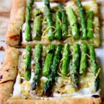 Two pieces of Asparagus Puff Pastry Tart.