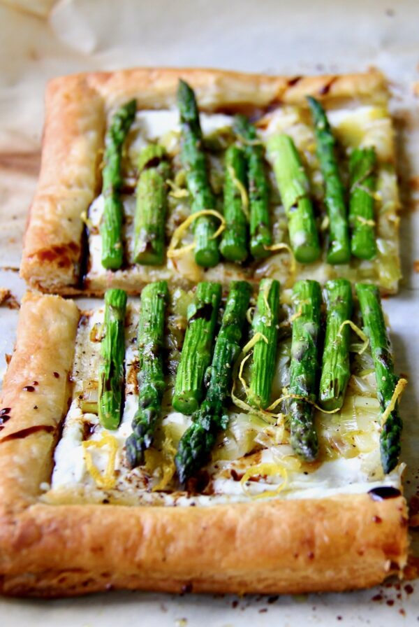 Two pieces of Asparagus Puff Pastry Tart.