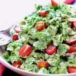 Chicken Bowtie Pasta Salad in white bowl.