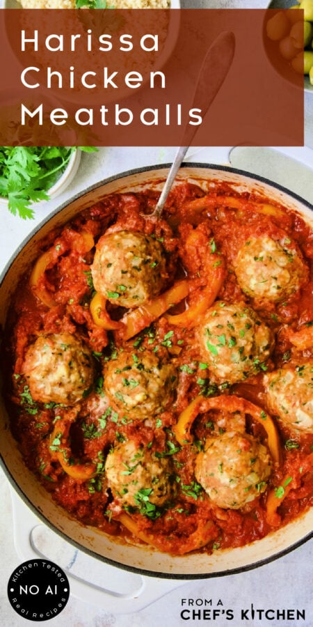 Pinterest graphic for Harissa Chicken Meatballs showing them in a white enamel cast iron skillet.