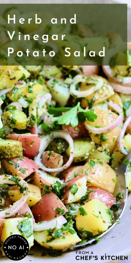 Pinterest graphic for Herb and Vinegar Potato Salad showing it in an earthenware bowl with serving spoon.