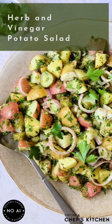 Pinterest graphic for Herb and Vinegar Potato Salad showing it in an earthenware bowl with serving spoon.