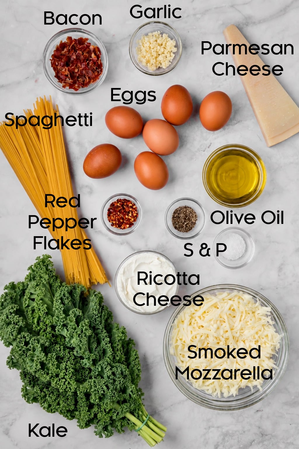 Ingredients for Pasta Frittata in glass bowls.