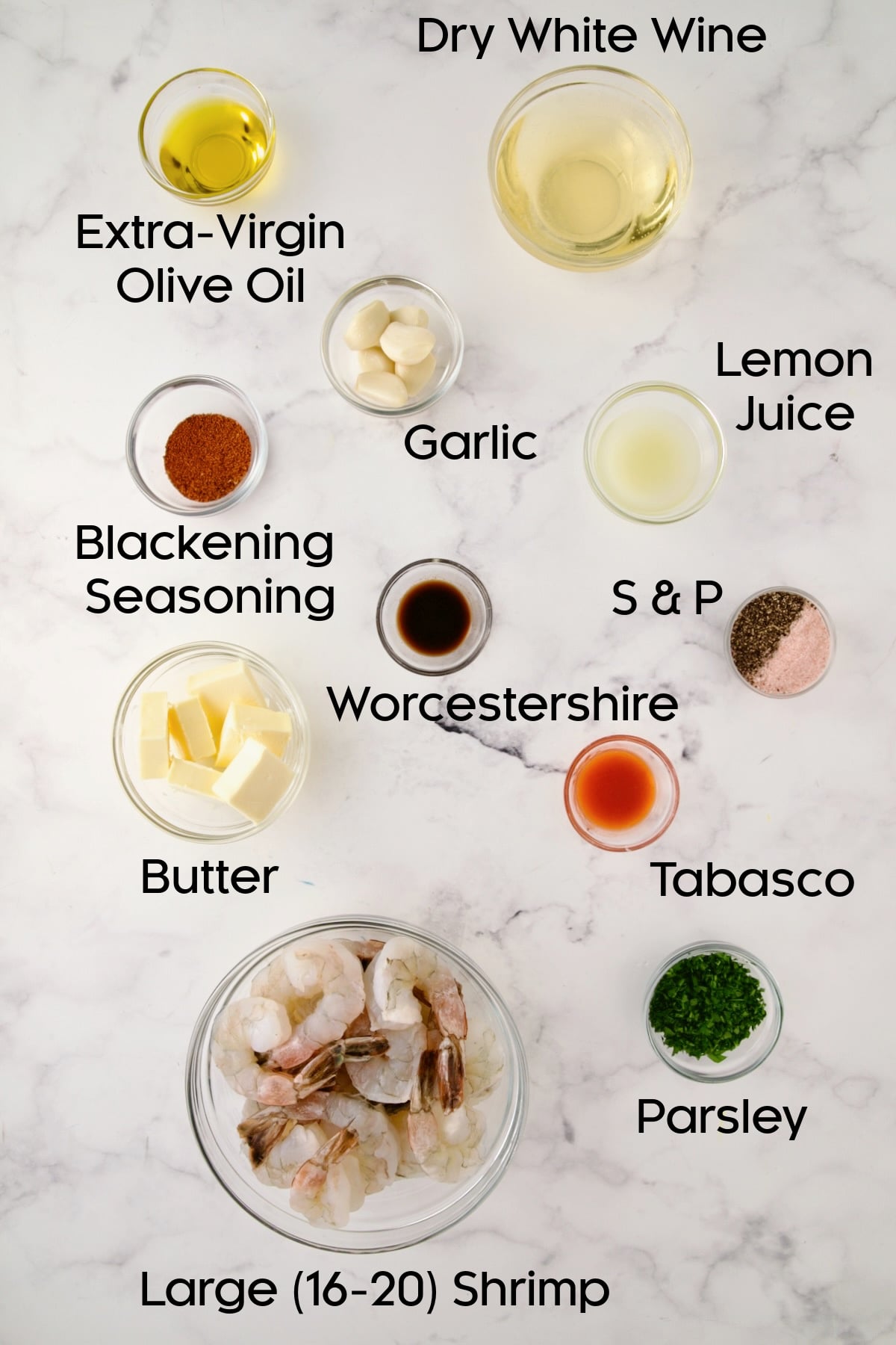 Ingredients for Cajun Butter Shrimp in glass bowls.