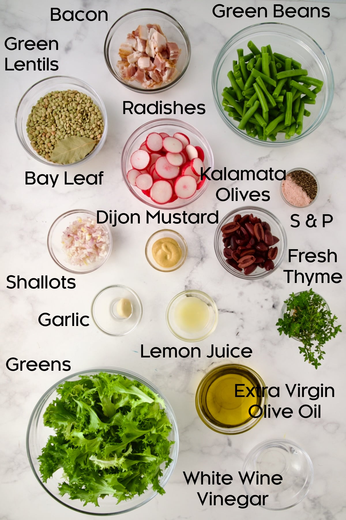 Ingredients for French Lentil Salad in glass bowls.