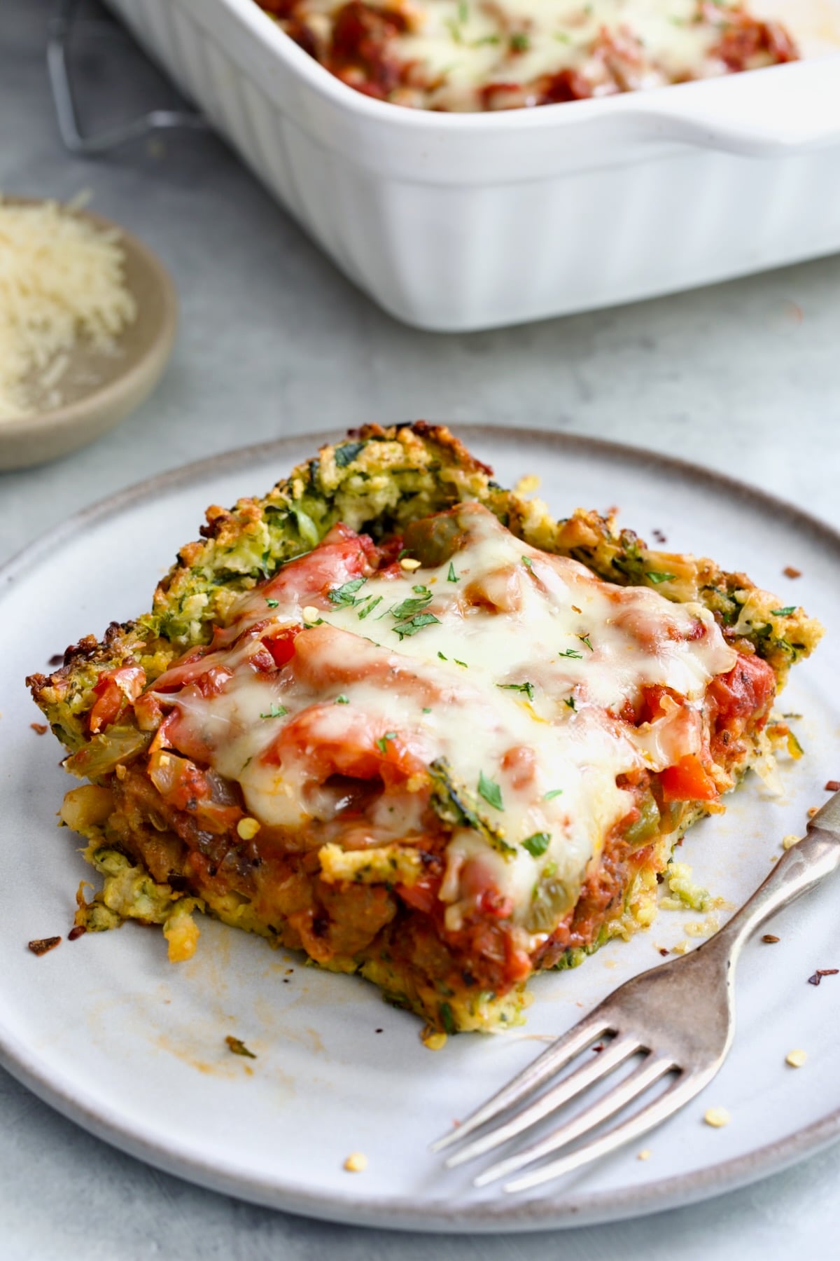 Piece of Zucchini Pizza Casserole on small plate.