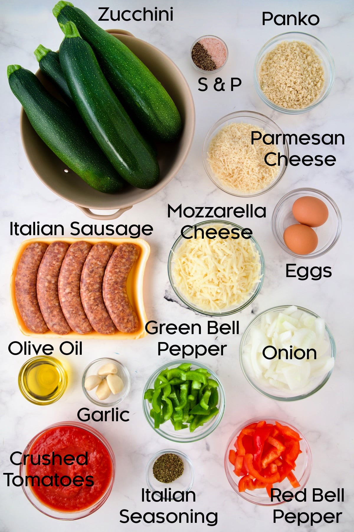 Ingredients for Zucchini Pizza Casserole in glass bowls.