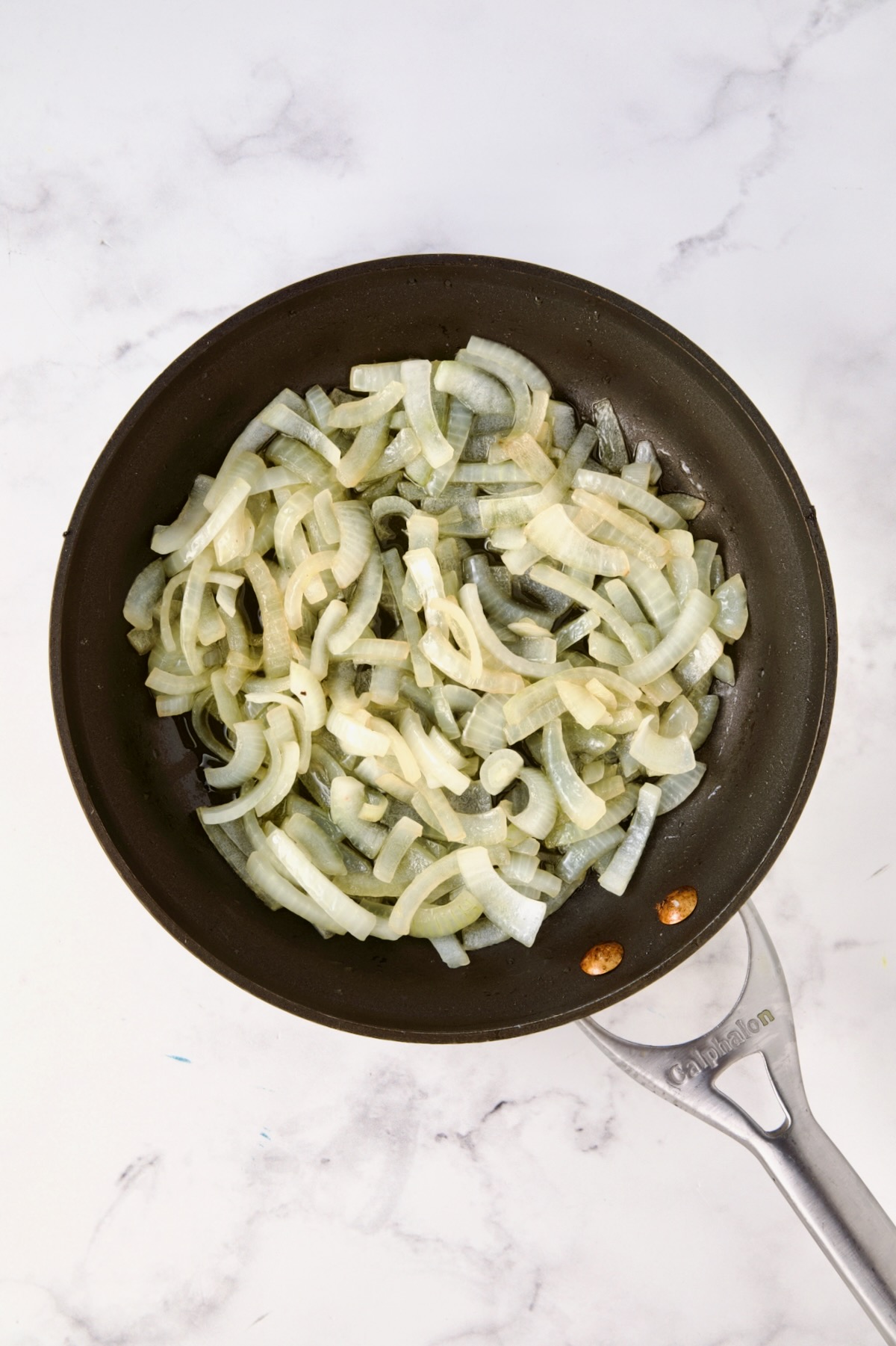 Cooked onions in nonstick skillet.