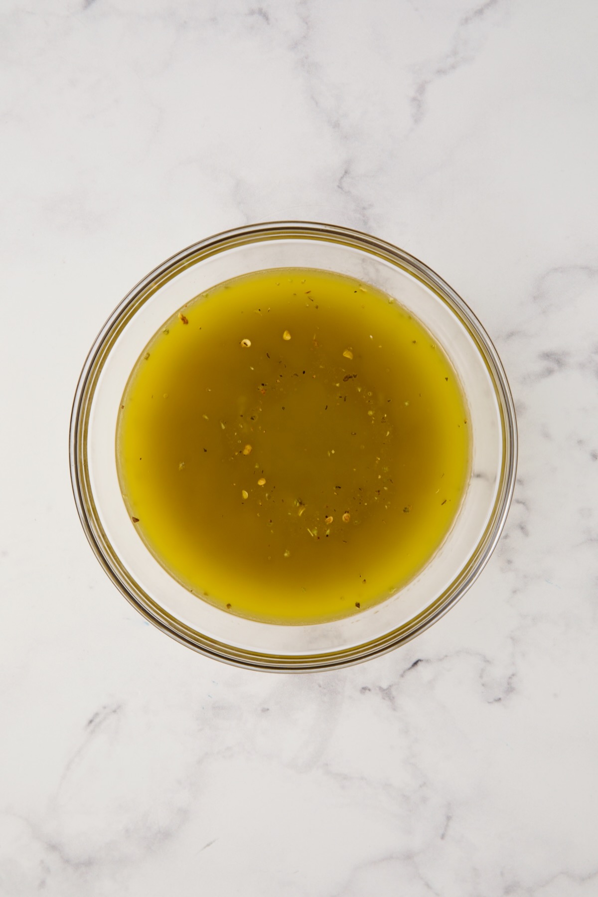 Vinaigrette in glass bowl.