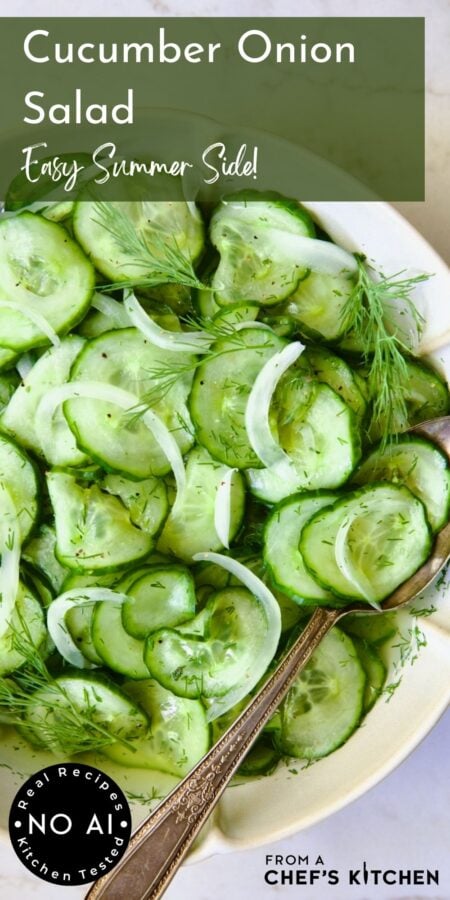 Pinterest graphic for Cucumber Onion Salad showing it in a serving bowl with serving spoon garnished with fresh dill.
