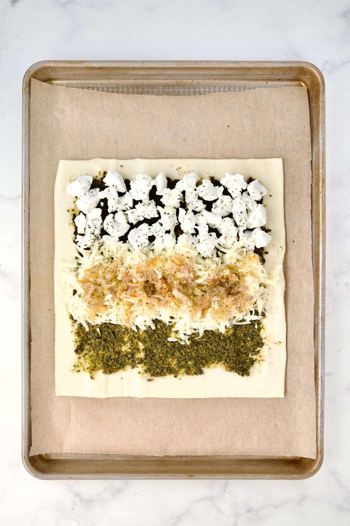 Shallot placed over the cheese.
