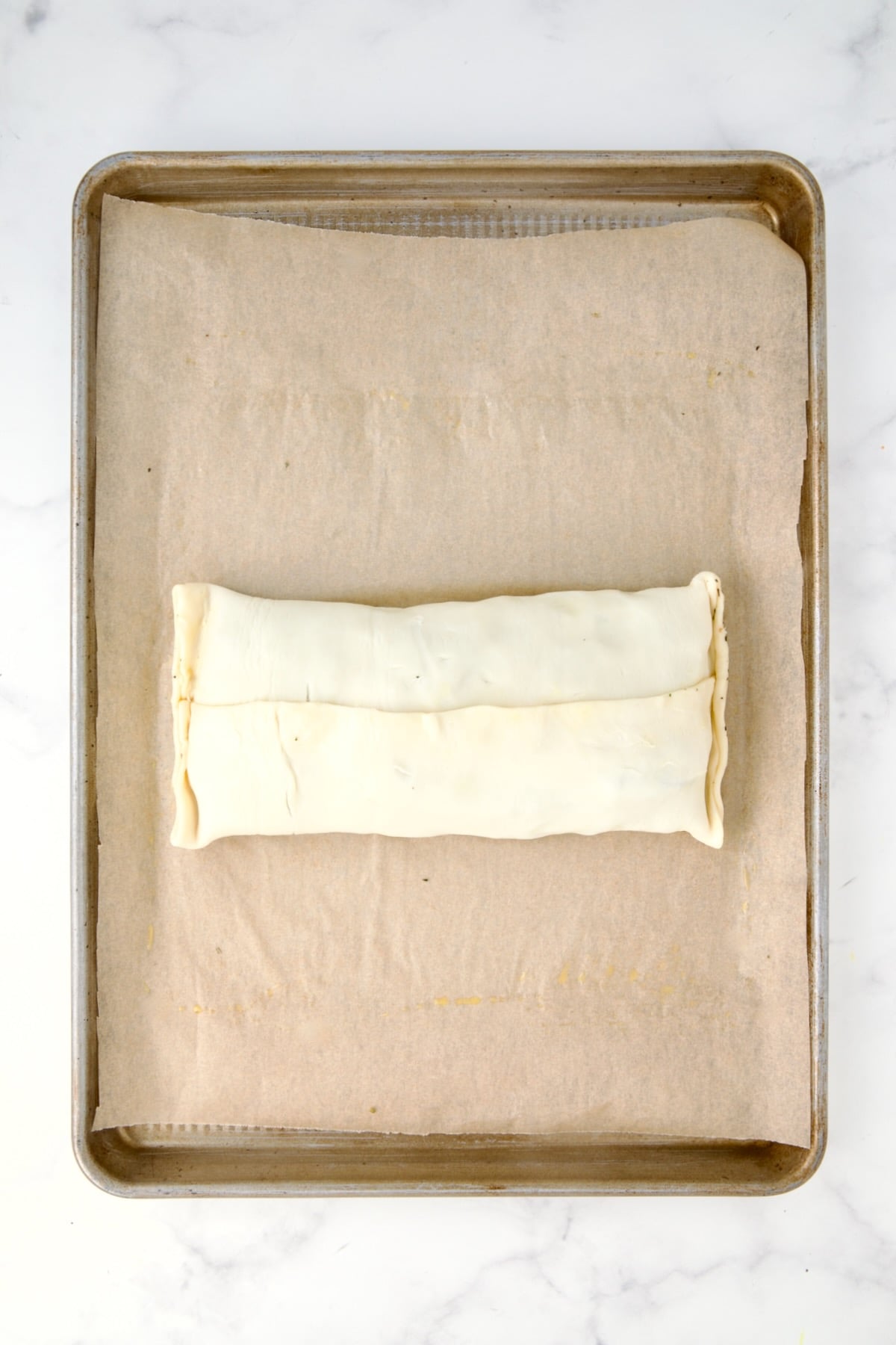 Fully assembled Italian Vegetable Strudel before being turned over for baking.